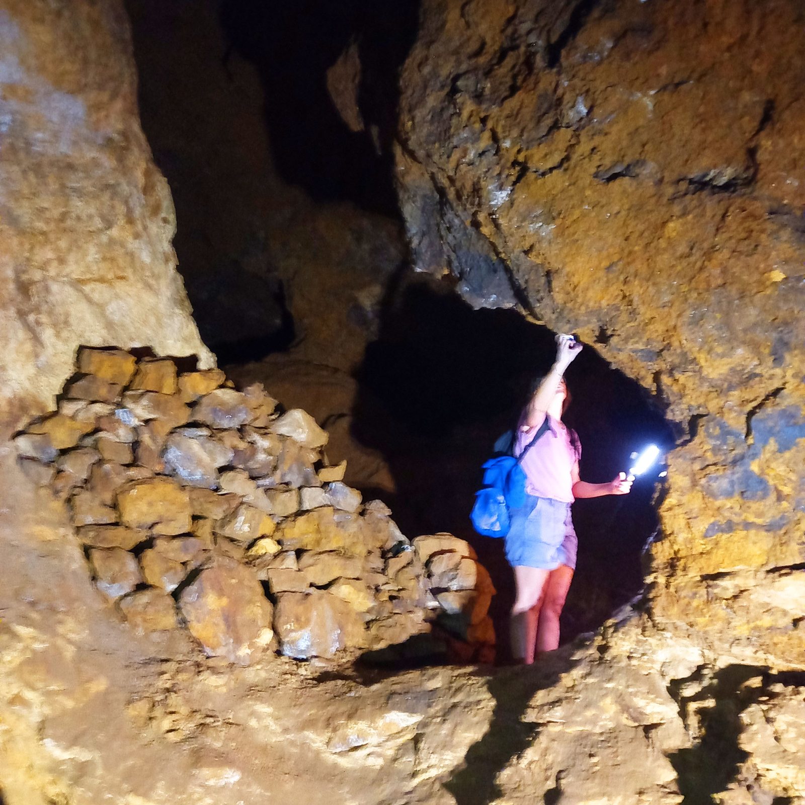A torch lighting a mine gallery