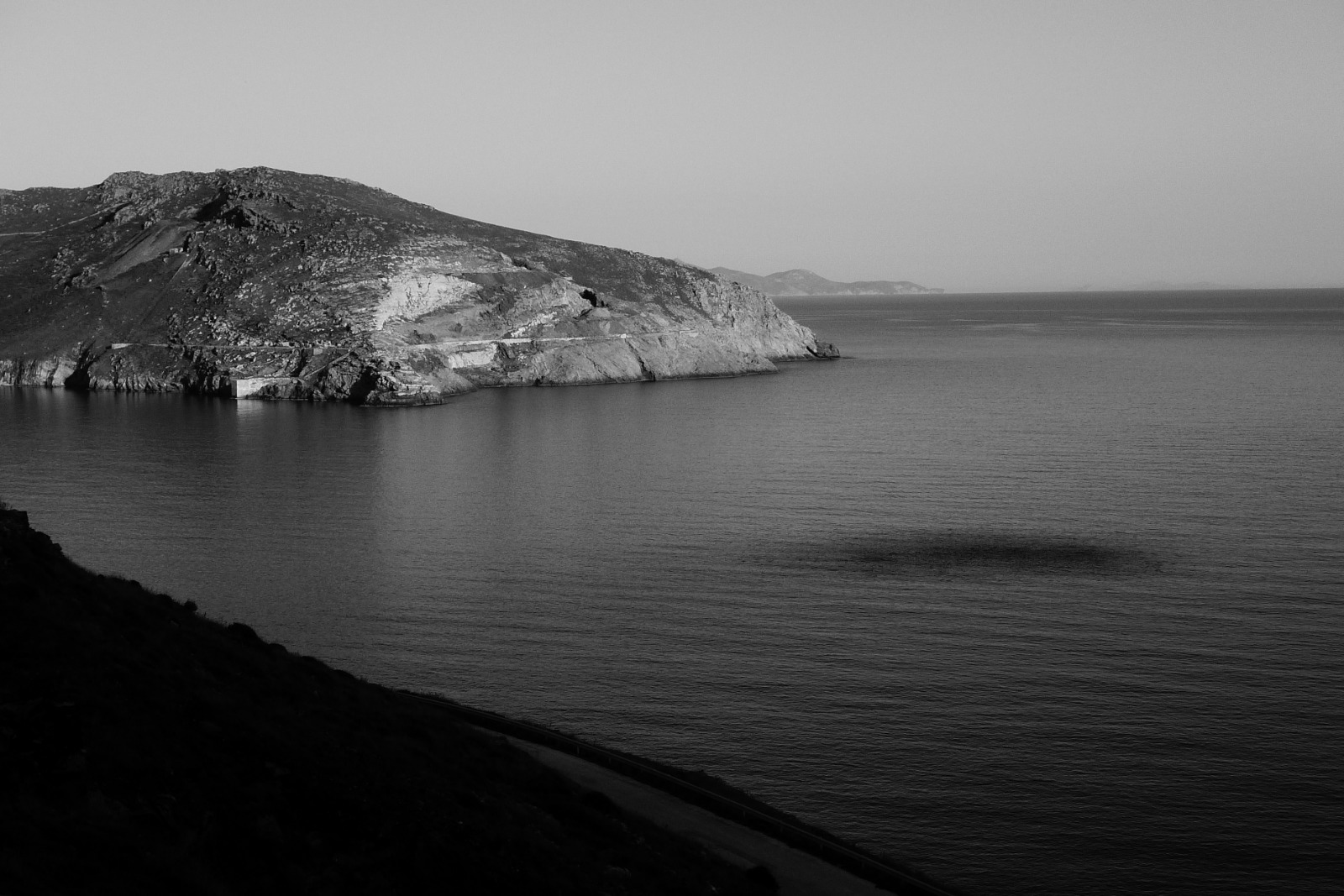 The coast of Serifos at dusk, seen from the mining road