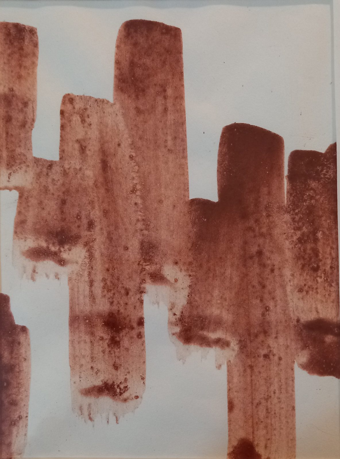 Drawing by Jeffrey Benjamin: rows of upright red-ochre brushstrokes like towers